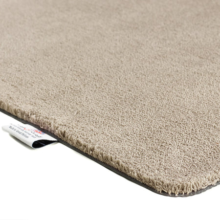 Close-up of the super soft texture of the Hug Rug Sense Bath Mat in Beige