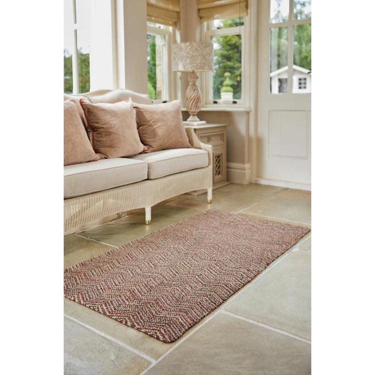 Sustainable entryway mat in modern red and navy pattern