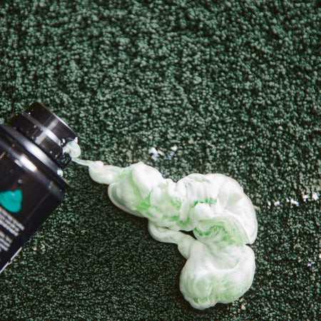 Close-up of the super soft texture of the Hug Rug Sense Bath Mat in Forest Green