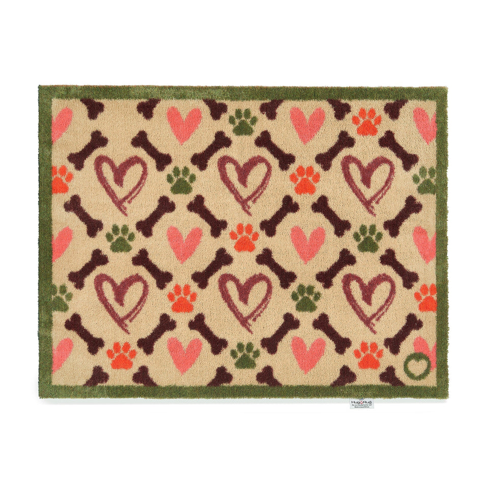 Hug Rug Hearts & Bones beige mat with hearts, bones, and paw prints