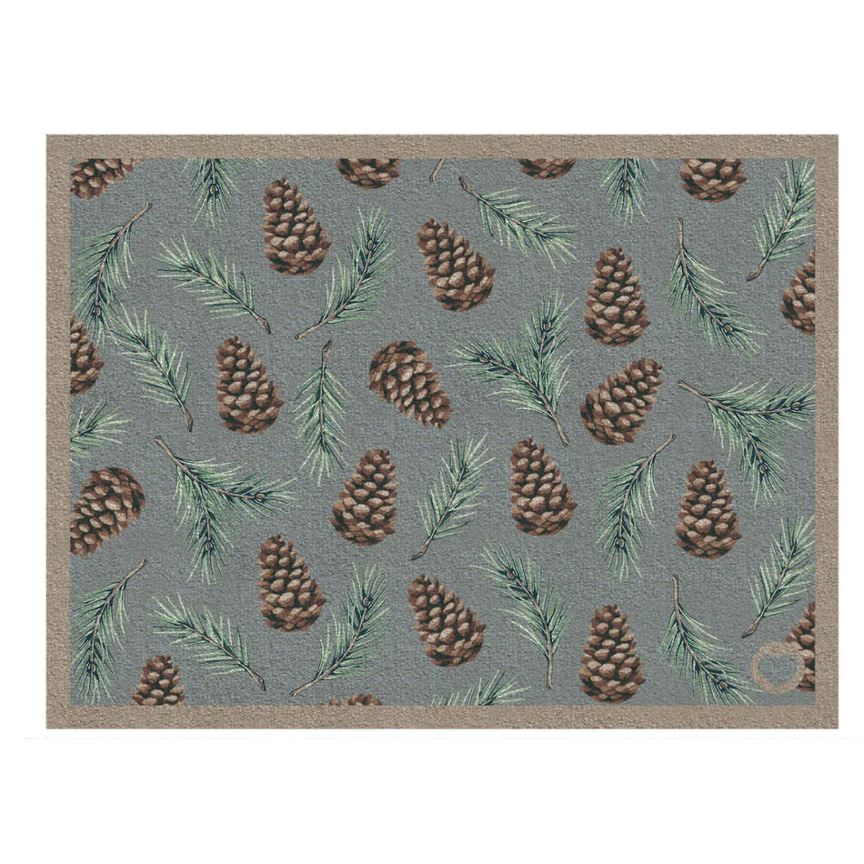 Hug Rug Pinecones washable doormat on duck egg background