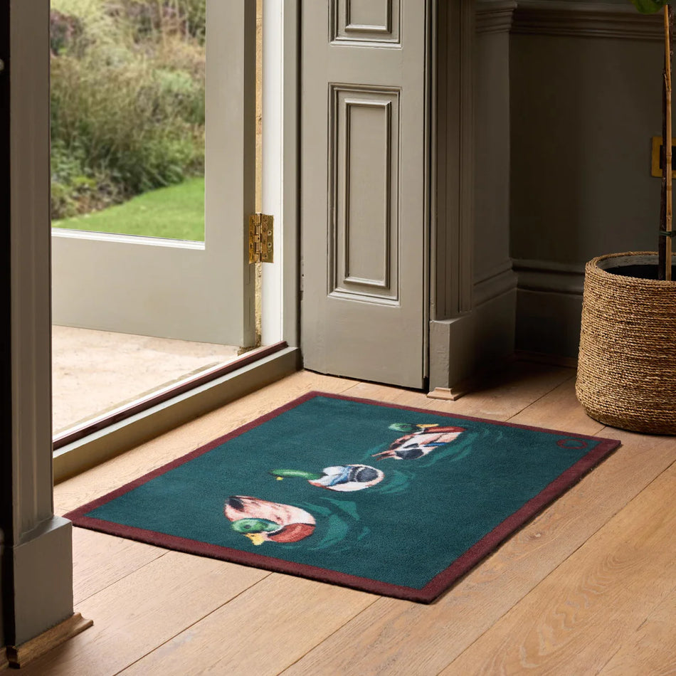 Eco-friendly teal Hug Rug with ducks