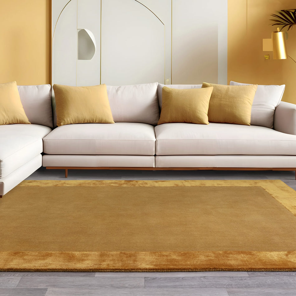 Living room rug in gold tone