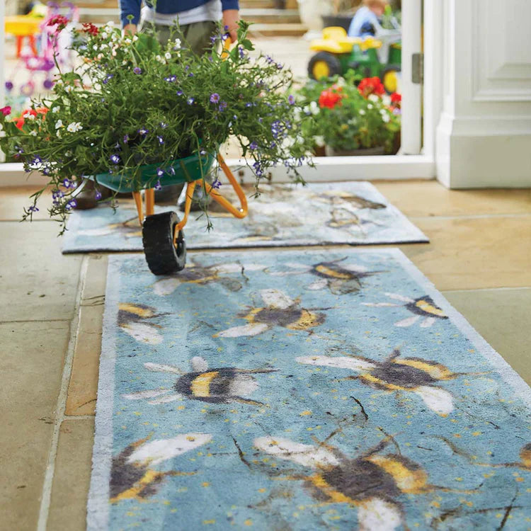 Hug Rug Bee 3 Charity Mat placed at an entrance – Traps dirt while supporting UK bee conservation
