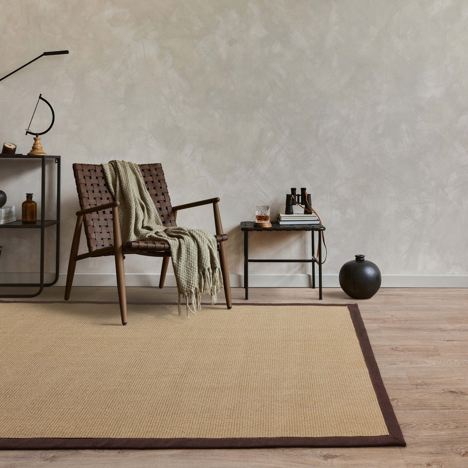 Asiatic sisal rug styled with wooden furniture