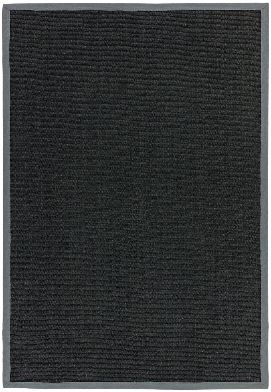 Flatwoven black rug with grey hand-stitched edge