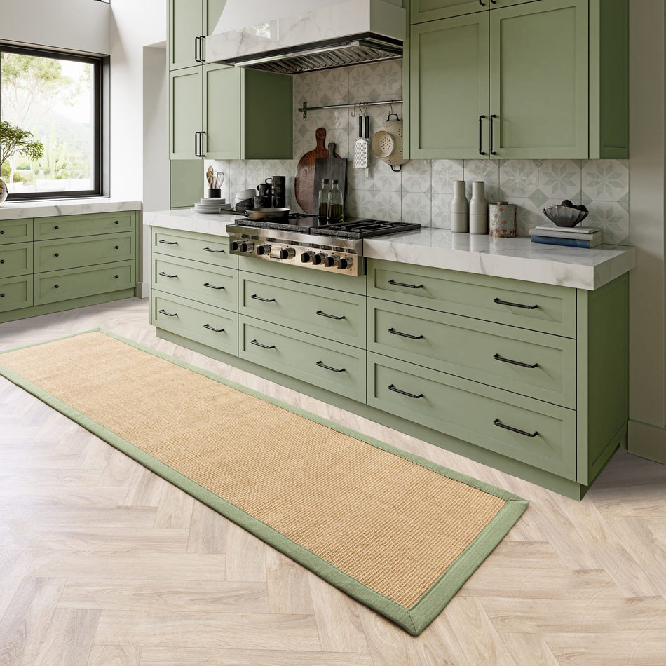 Asiatic sisal rug in kitchen with green detail
