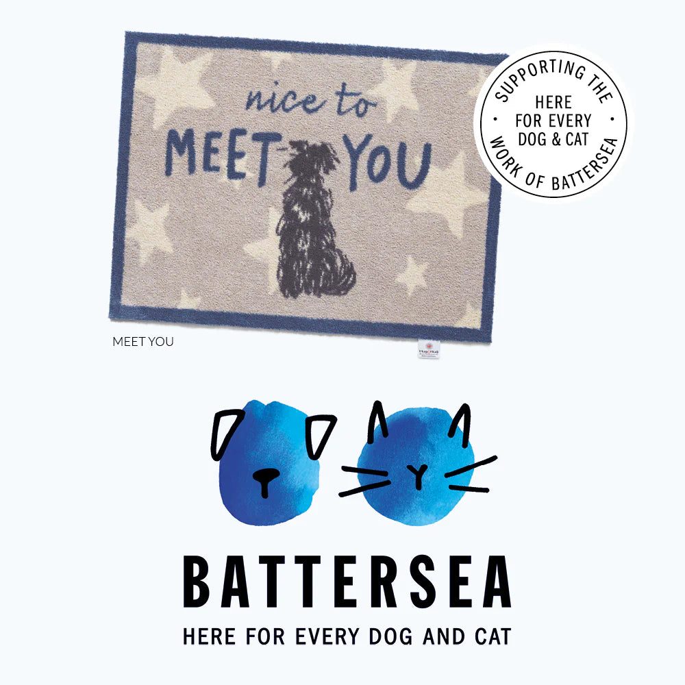 Doormat with 'nice to MEET YOU' text and a dog illustration, featuring Battersea Dogs and Cats Home branding.
