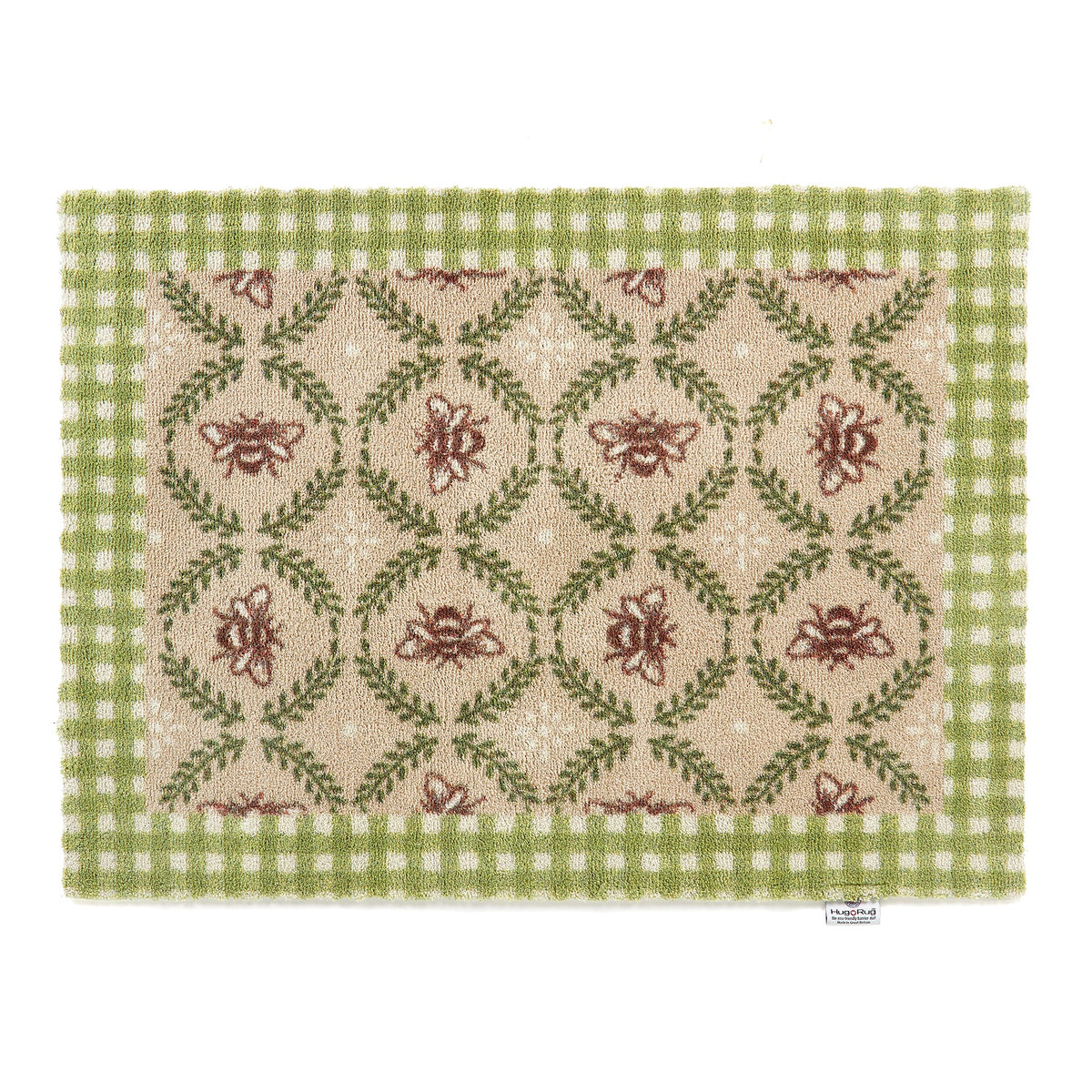 Decorative doormat with floral pattern and green border on a white background