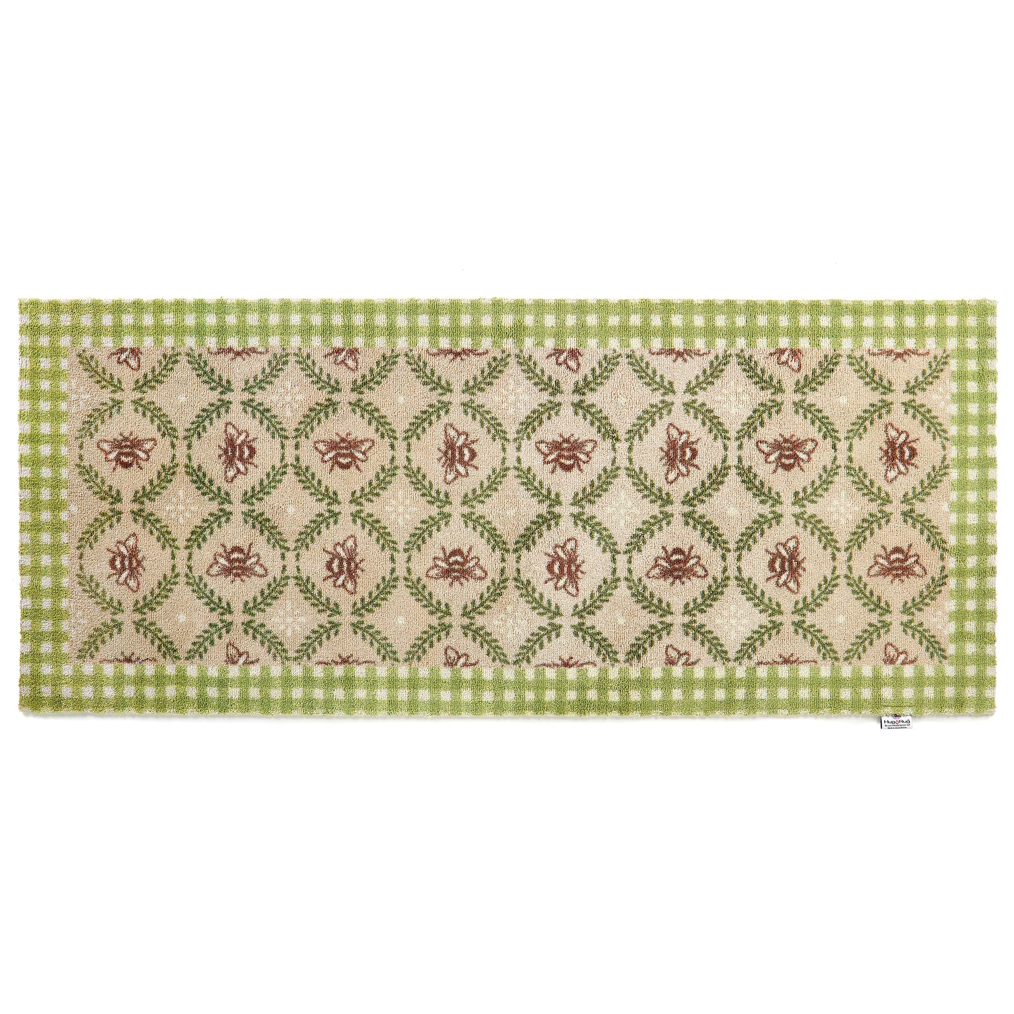 Decorative floor runner with green and beige pattern on a beige bee hive background