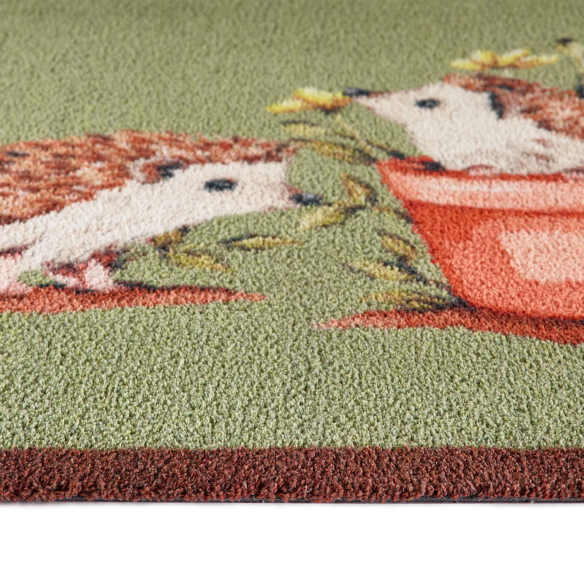 Close-up of Hug Rug Hedgehog Friends' non-slip backing

