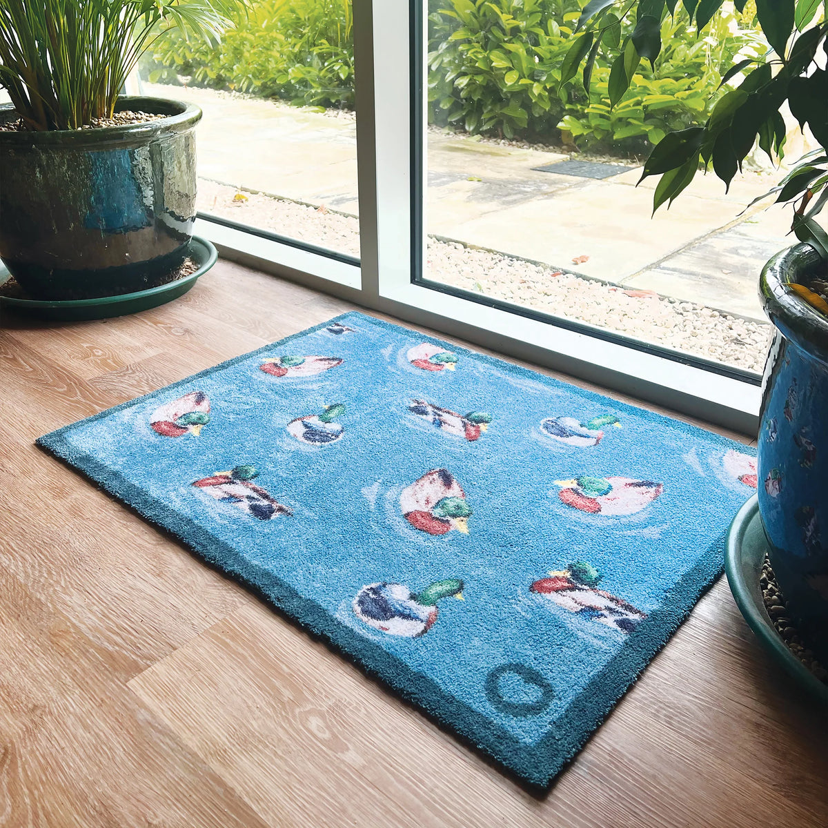 Hug Rug Swimming Ducks on wood or tile floor