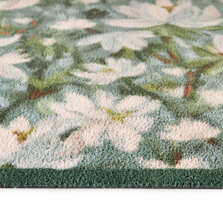 Close-up of Hug Rug Water Lilies floral and duck design

