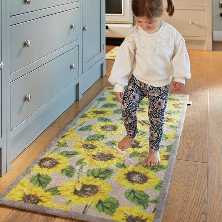 Bright floral Hug Rug on tile or wooden flooring