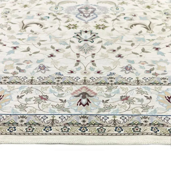 Decorative floral-patterned rug with intricate designs on a white background