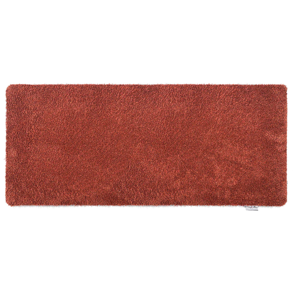 Red rectangular rug  runner on a white background