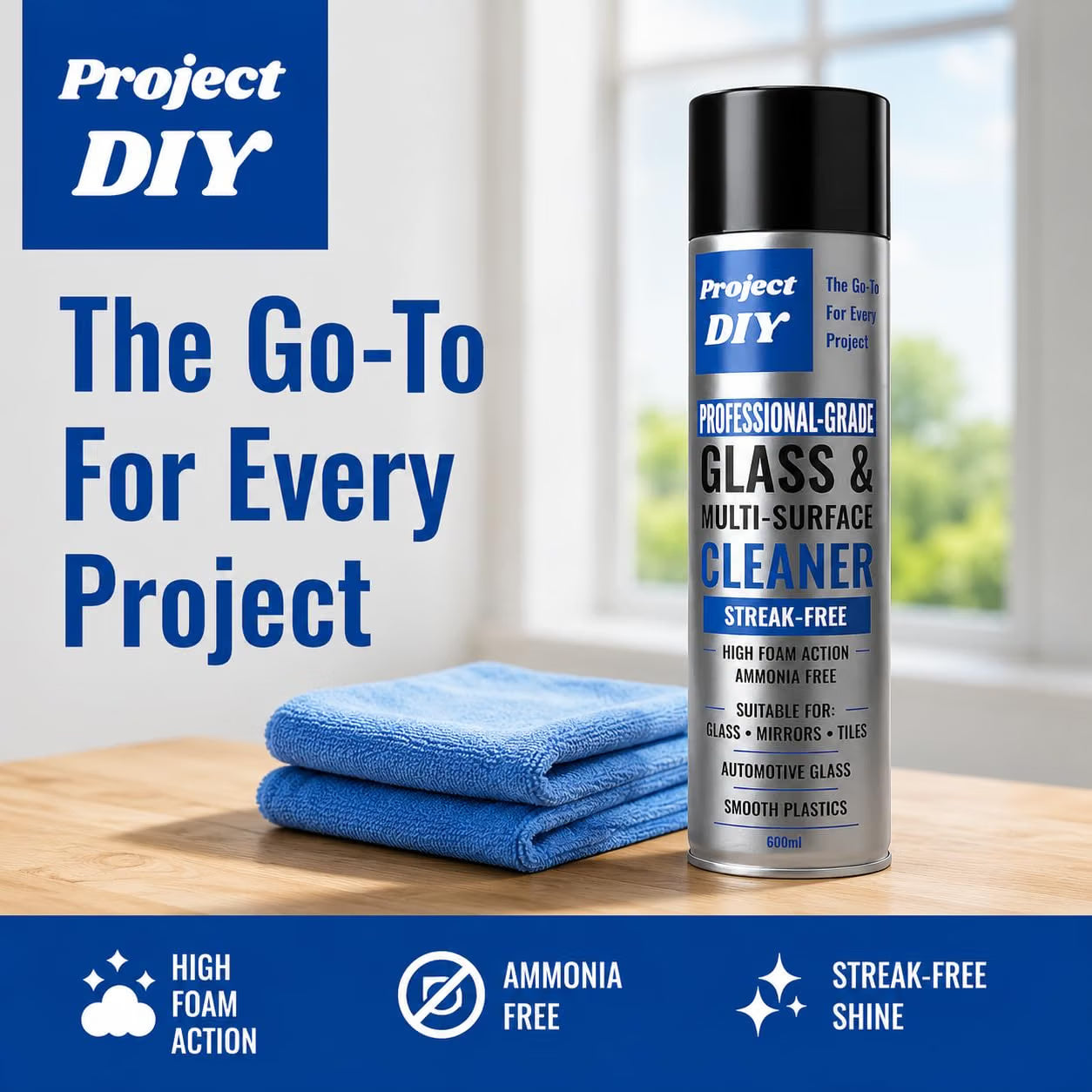 A can of Project DIY Professional-Grade Glass & Multi-Surface Cleaner stands on a wooden surface next to two folded blue towels, with large promotional text and feature icons on a blue banner. The background shows a softly blurred indoor window scene.