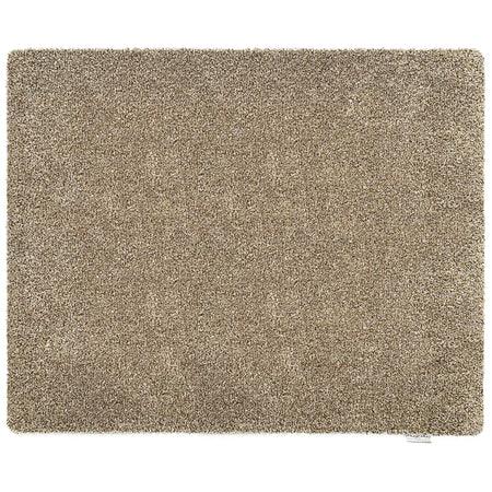Beige shaggy rug on a white background