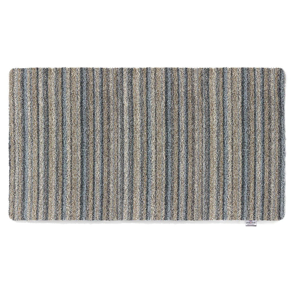 Striped doormat runner with blue and gray pattern on a white background