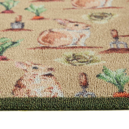 Close-up of Hug Rug rabbit and vegetable design

