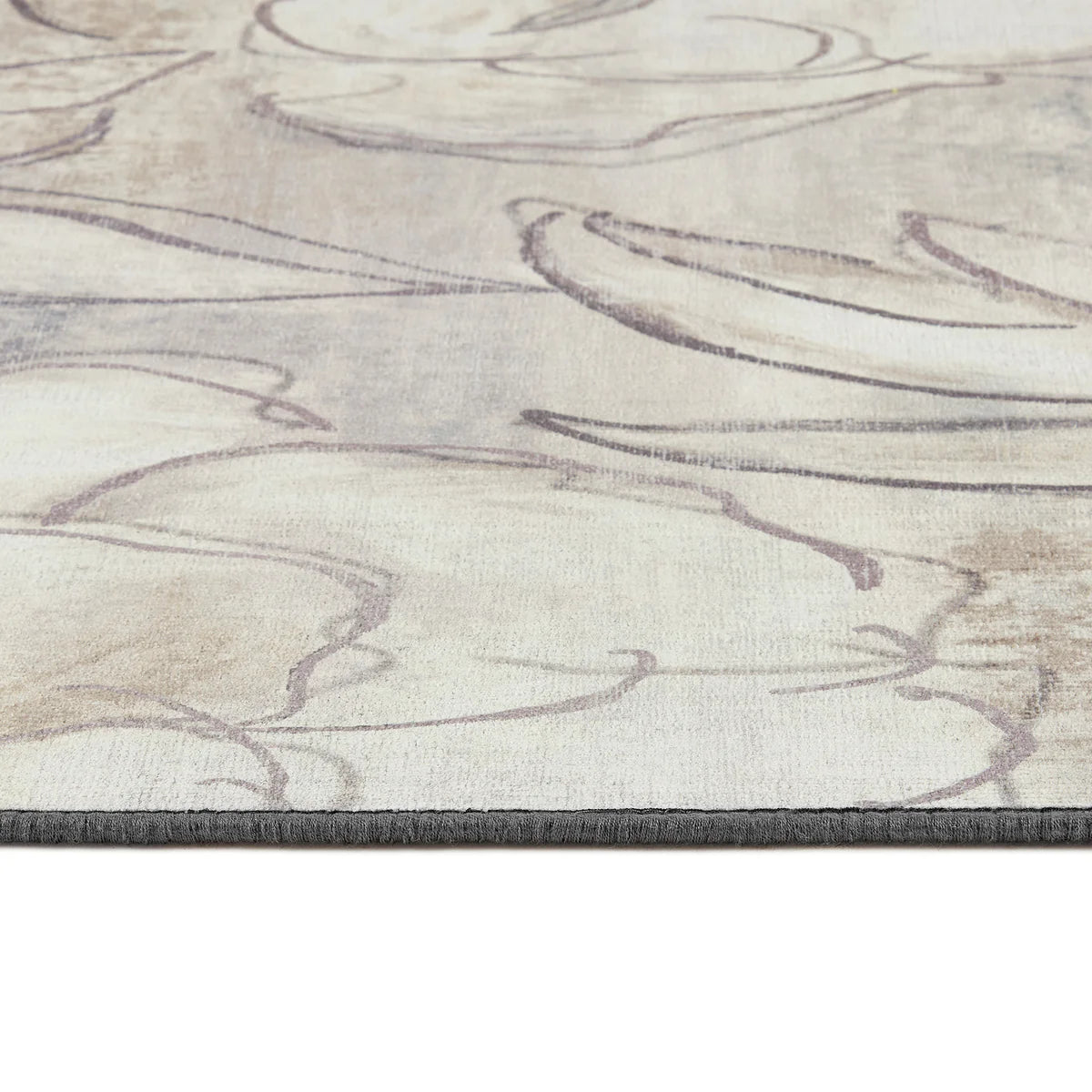 Close-up of a rug with abstract pattern on a plain background
