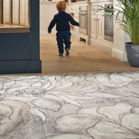 Oversized brushstroke floral rug in grey and beige tones

