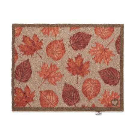 Autumn-themed Hug Rug with orange and brown leaf patterns

