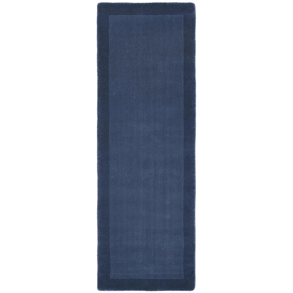 Navy blue bath mat on a white background