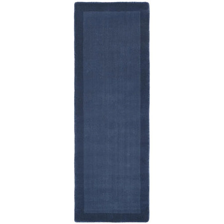 Navy blue bath mat on a white background