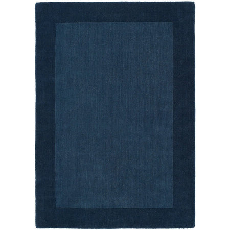 Rectangular blue rug on a white background