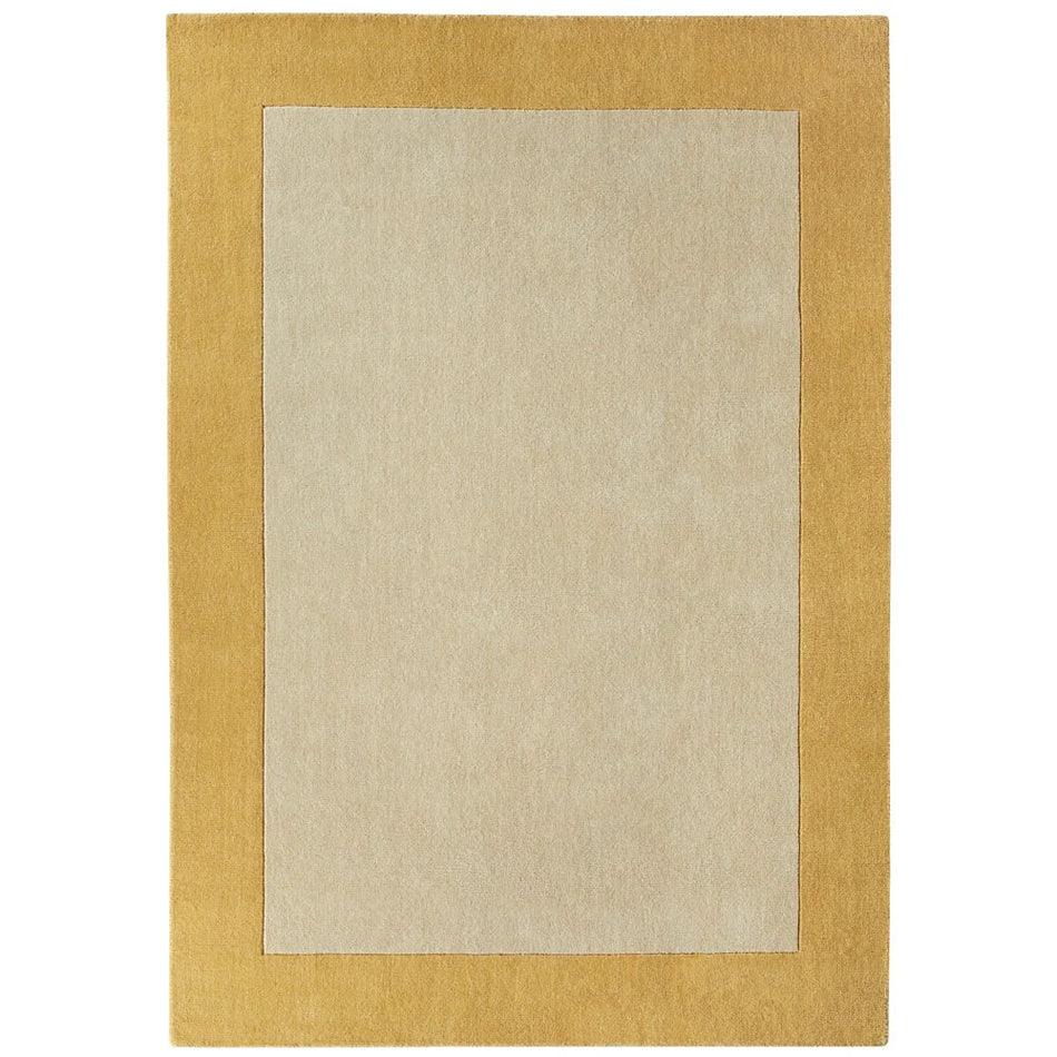 hug rug origins Rectangular rug with a beige center and yellow border on a white background