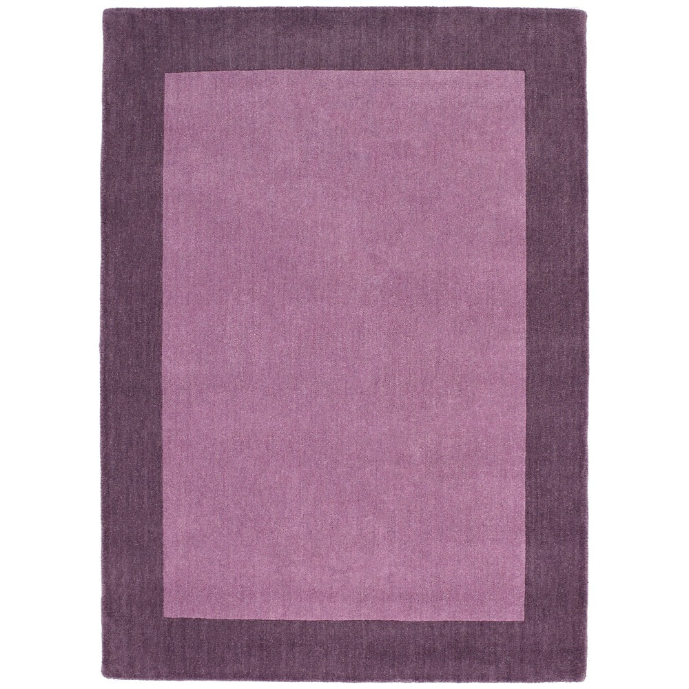 Purple rug with a solid color design on a white background