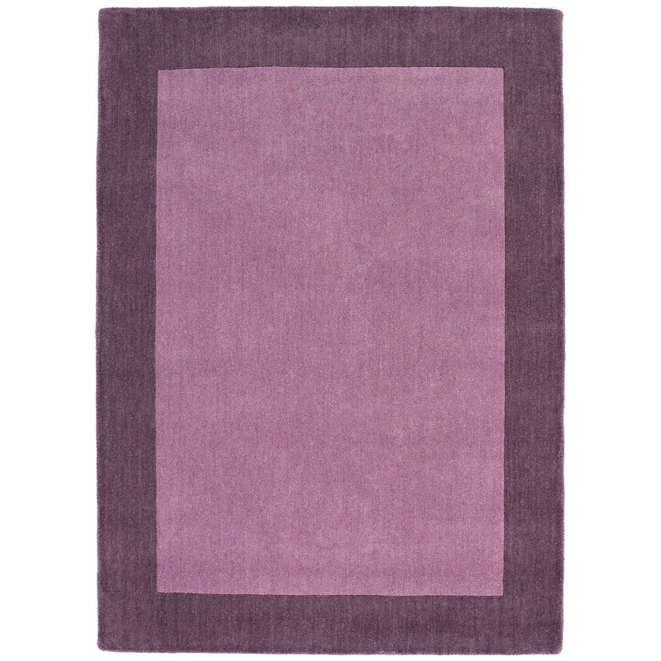 Purple rug with a solid color design on a white background