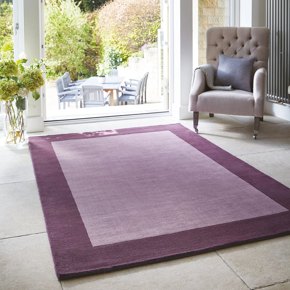 Hug Rug Origins Borders Mauve wool rug in living space