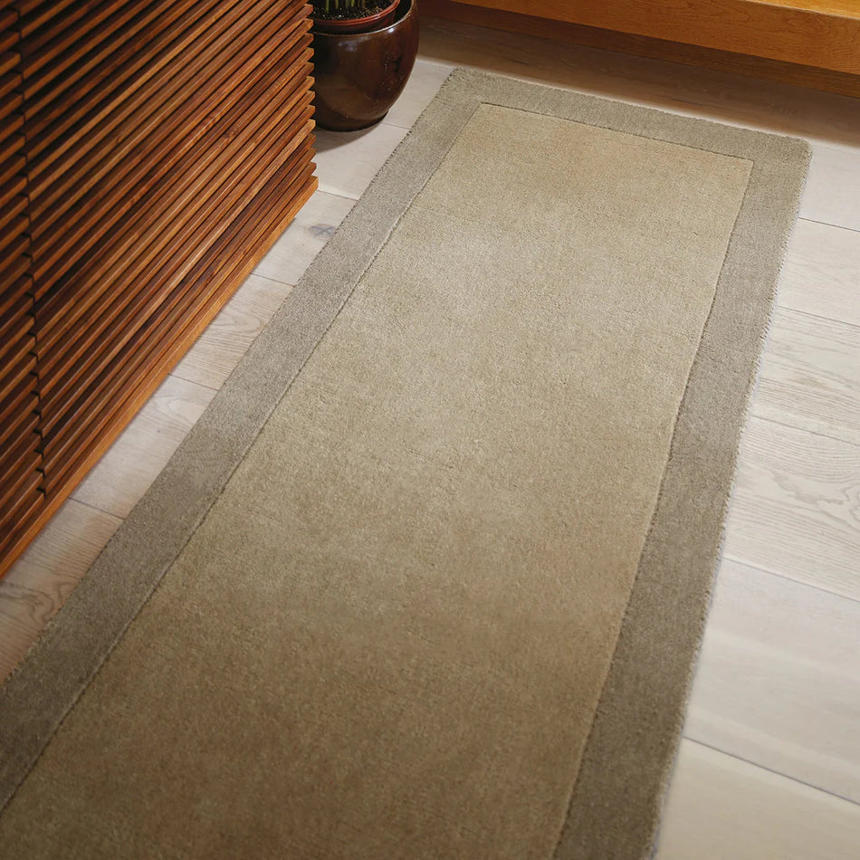 Hug Rug Origins Borders Taupe wool rug in hallway