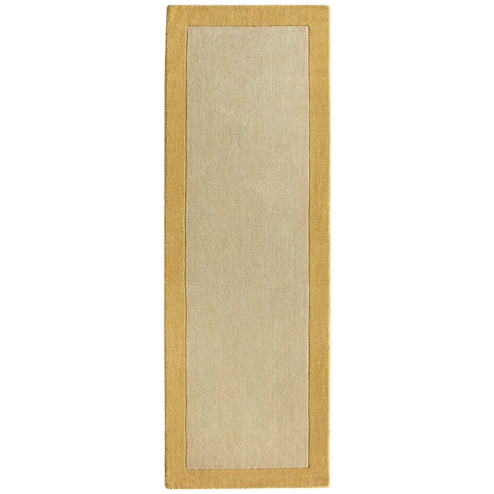 Beige runner rug with a yellow border on a white background