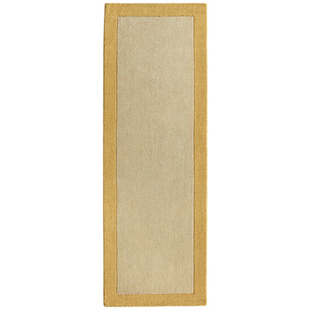 Beige runner rug with a yellow border on a white background