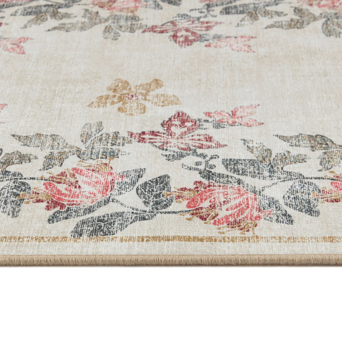 Close-up of distressed floral design and beige tape edge

