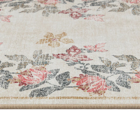 Close-up of distressed floral design and beige tape edge

