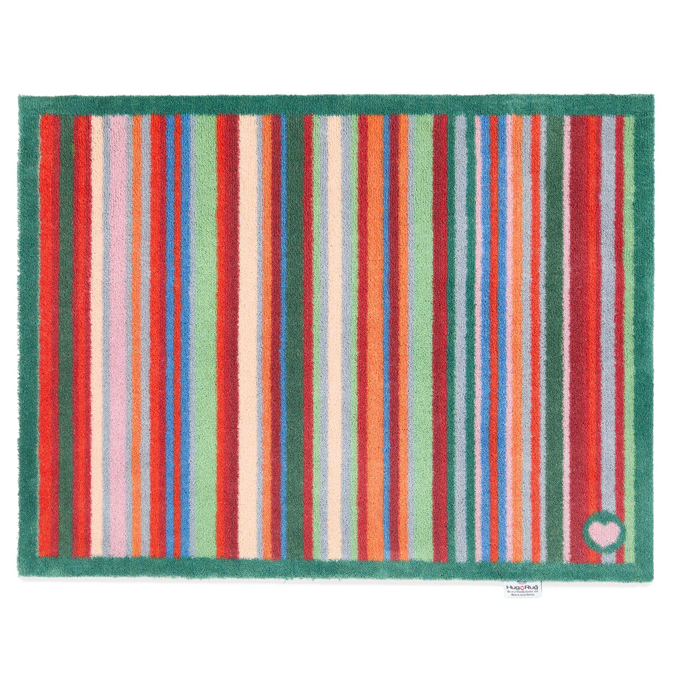 Hug Rug Bright Green Stripe doormat with green, red, and orange tones


