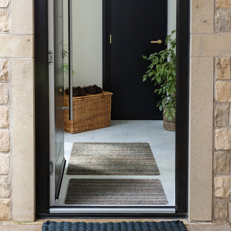 Hug Rug Plain Candysage catching dirt at doorway

