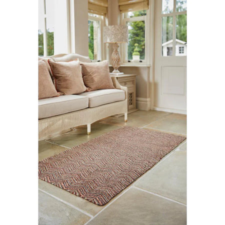 Sustainable entryway mat in modern red and navy pattern

