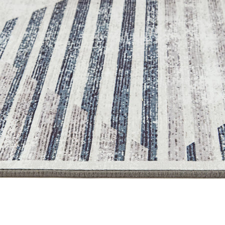 Striped rug with blue and gray pattern on a white background
