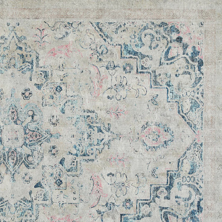 Patterned rug with intricate design on a neutral background