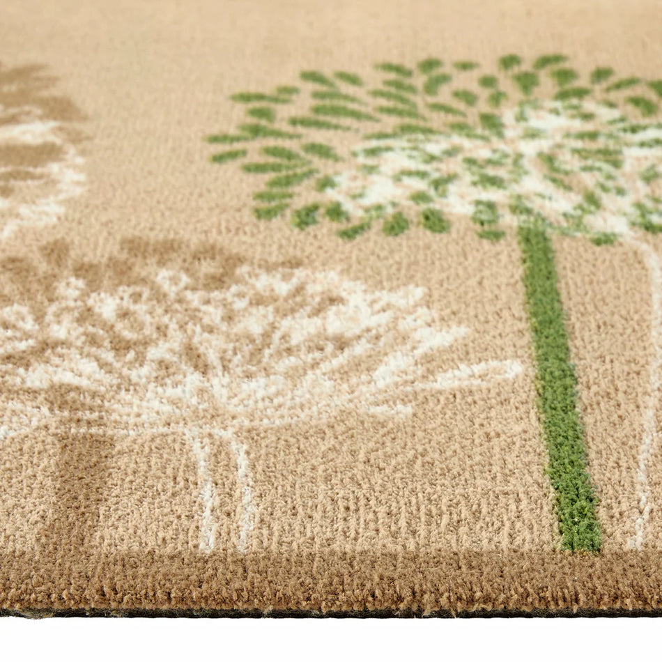 Close-up of Hug Rug dandelion design and soft cotton tufts

