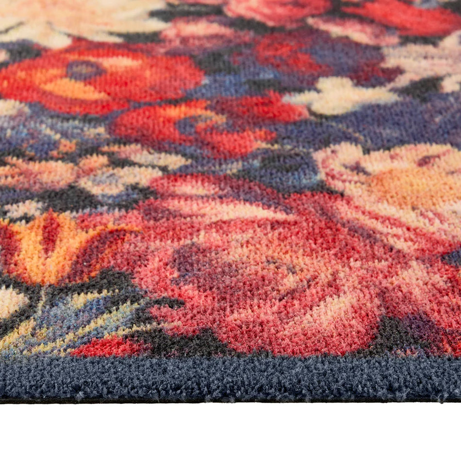 Close-up of Hug Rug vibrant dark floral design

