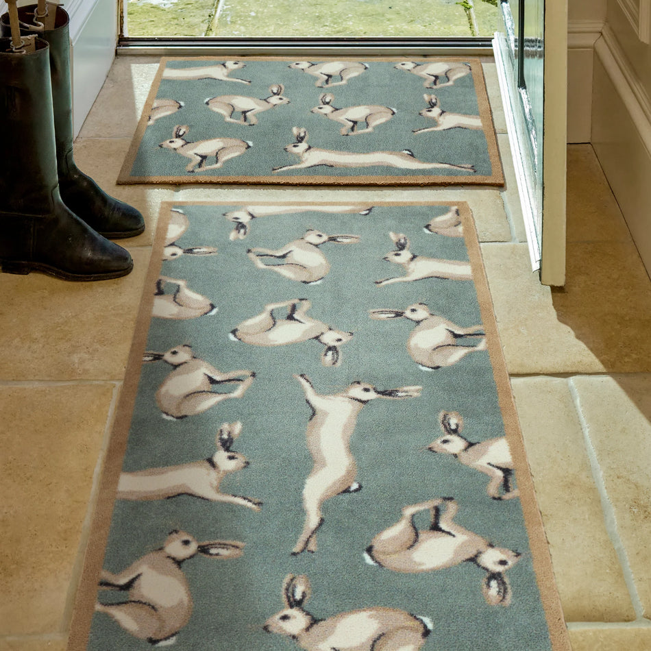 Hug Rug Farmhouse Hares catching dirt at doorway

