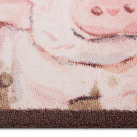 Close-up of a rug with a cartoon character design on a white background
