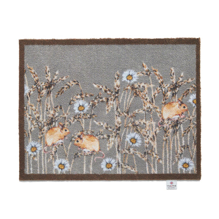 Decorative rug with mouse and flower design on a gray background