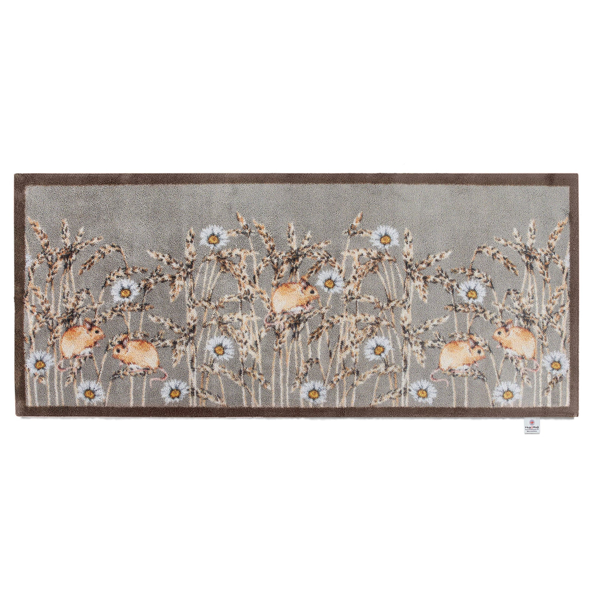 Decorative rug runner with floral and deer design on a gray background